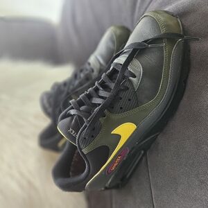 Nike Black and Yellow Sneakers with Modern Design